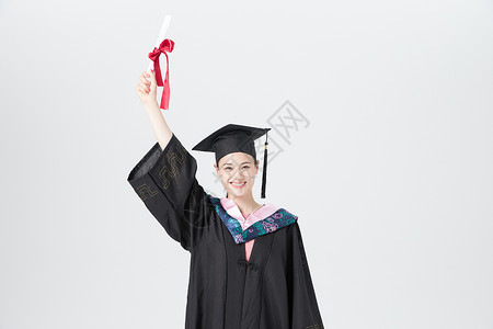 女性大学生毕业手持荣誉证书背景图片