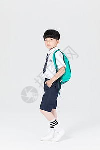 背着小孩军人背着书包准备上学的小男生男孩背景