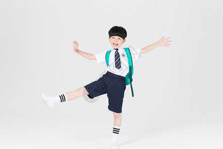 男孩上学插画背着书包准备上学的小男生男孩背景