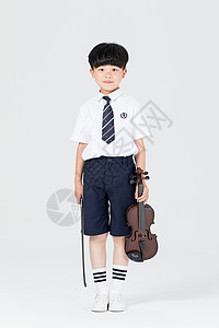 拉小提琴的男孩拉小提琴表演的小男孩背景