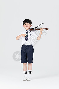 儿童小提琴拉小提琴表演的小男孩背景