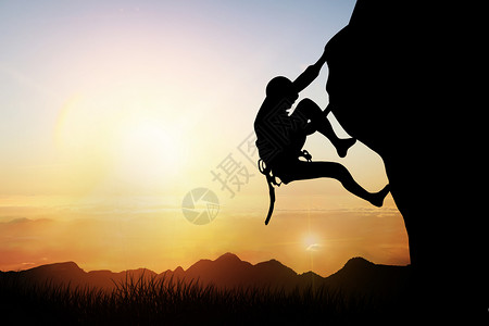 女人背包登山的人物剪影设计图片