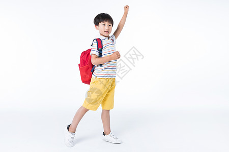 活泼的孩子背着书包背景图片