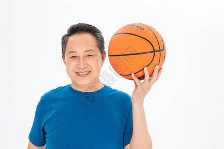 运动装退休打篮球的老年人背景