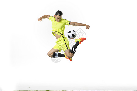 足球员空中射门足球动作背景