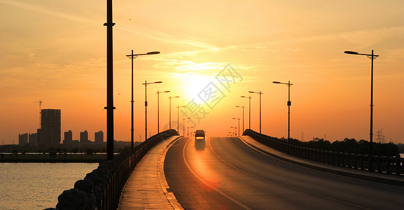 汽车风景夕阳下的公路背景