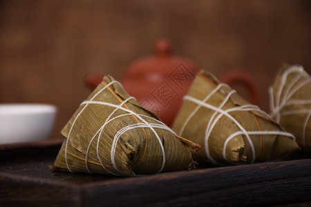 绿色粽子叶中国传统端午节节日美食粽子背景