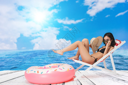 沙滩晒太阳美女美女日光浴设计图片