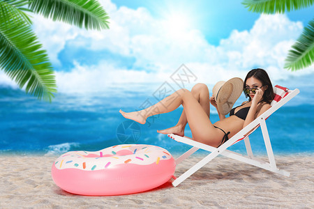 沙滩晒太阳美女日光浴设计图片