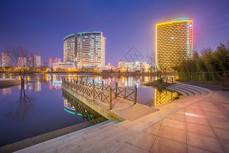 栈桥夜景生态城市夜景背景