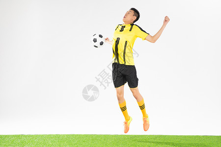 足球运动员接球动作背景图片