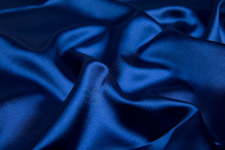 蓝色绸缎蓝色丝绸背景素材背景