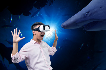 带VR眼镜的青年VR体验设计图片