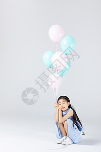 拿气球的小女孩背景图片