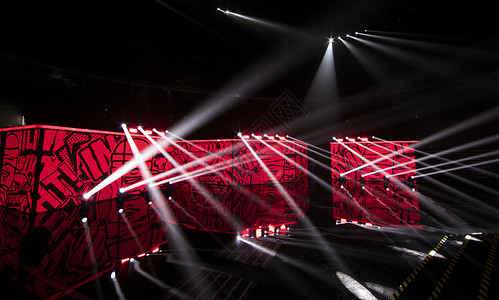 红色射灯光效舞台灯光背景