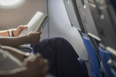 飞机上看广州在飞机上阅读背景