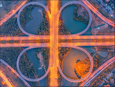 对称公路繁华城市夜晚的立交桥背景