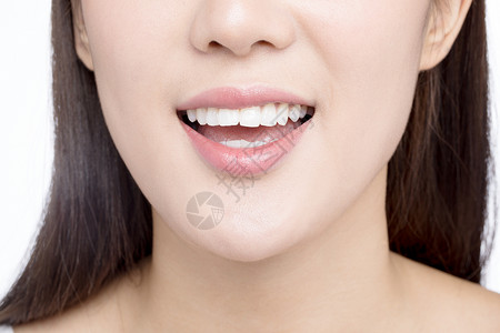 女性牙齿展示背景图片