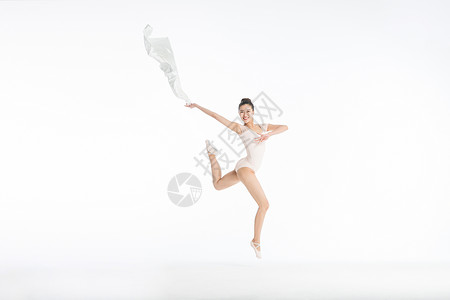 舞蹈丝带美女跳跃背景图片