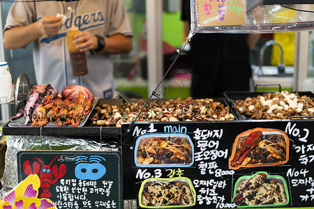 美食市场韩国首尔传统市场小吃背景