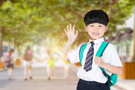 小学生背着书包上学设计图片