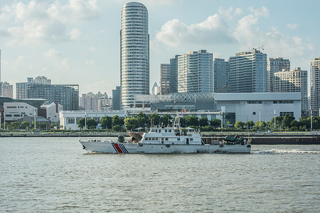 海警船舶驶过黄浦江背景