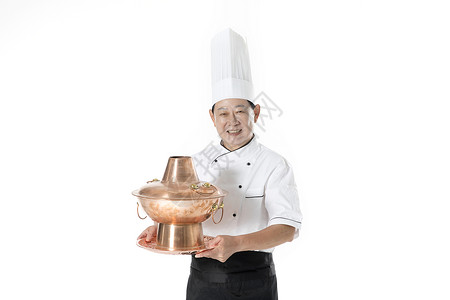 传统佳肴厨师拿铜锅背景