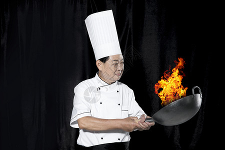 厨师掌勺大火烹饪高清图片