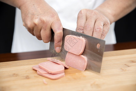 厨师切肉背景图片