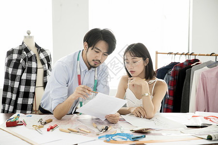 男女服装素材男女服装设计师背景