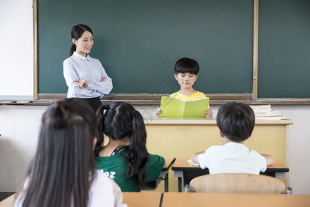 女教师上课小学生背景图片