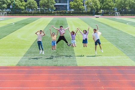 足球训练营招生大学生开心跳跃背景