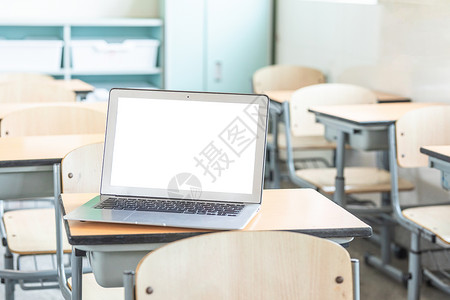 网络教学平台课桌上的笔记本电脑背景