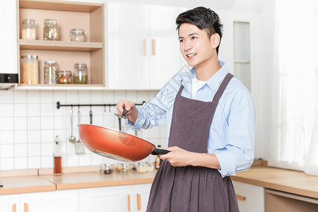 做饭的男生背景图片