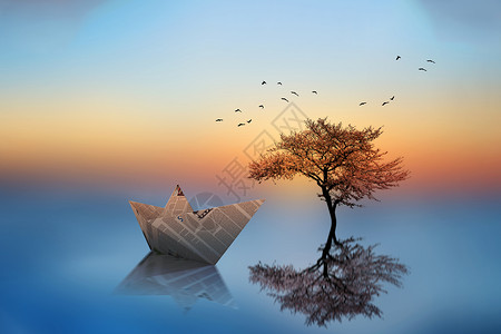 鸟自然湖泊上的纸船设计图片