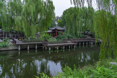 桥亭河池上的亭背景