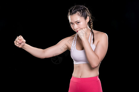 运动健身女性出拳图片