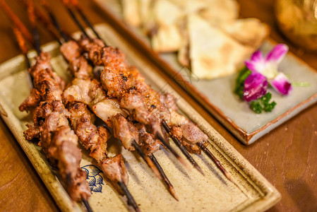 新疆菜新疆烤羊肉串背景