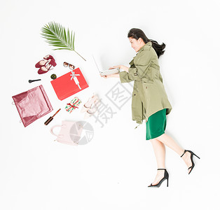 绿色化妆品礼盒年轻时尚女性购物背景