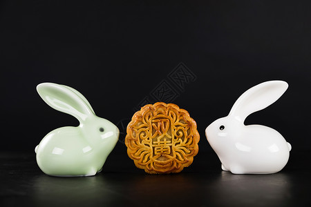 喝奶茶的兔子中秋节广式月饼背景