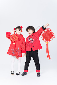 新年儿童手拿中国结拜年图片