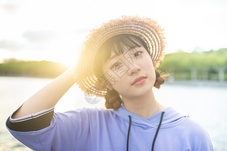 戴草帽的少女戴草帽的小清新美女背景