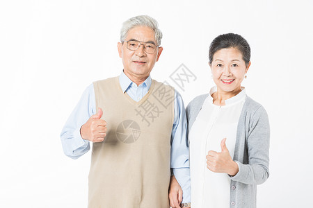 幸福的老年夫妻举大拇指图片