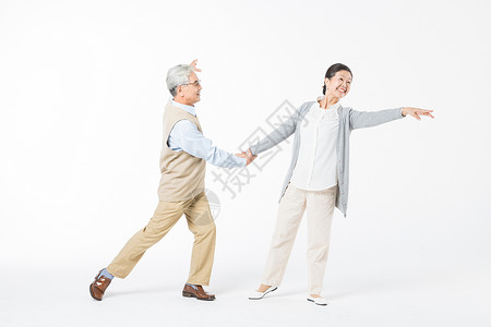 老人运动跳舞幸福的老年夫妻跳舞背景