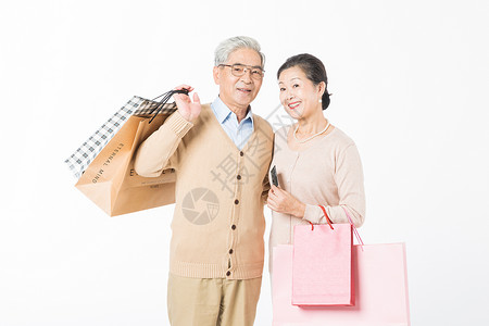 幸福的老年夫妻消费购物图片