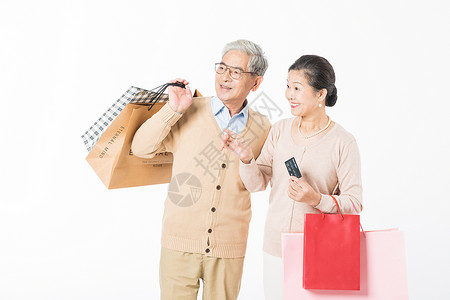 恩爱老年夫妻购物幸福的老年夫妻消费购物背景