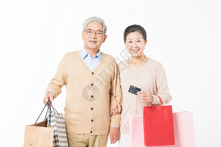 幸福的老年夫妻消费购物高清图片