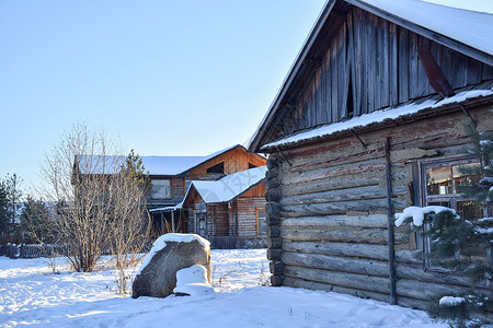 北方下雪北极村俄式建筑背景
