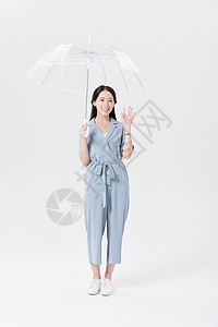 年轻美女撑伞打伞形象图片