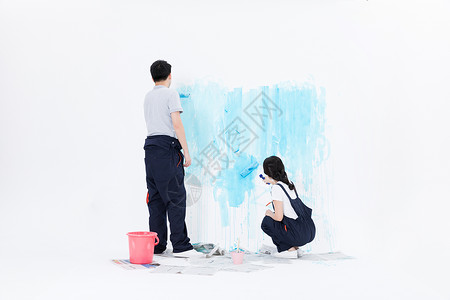 油漆工作年轻夫妻刷墙装修背景